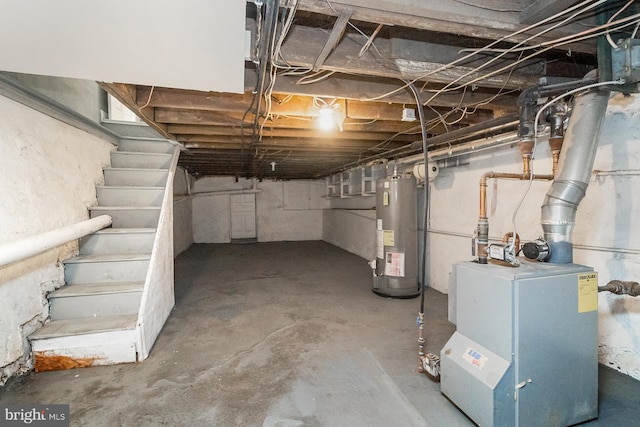 unfinished basement featuring stairs and gas water heater