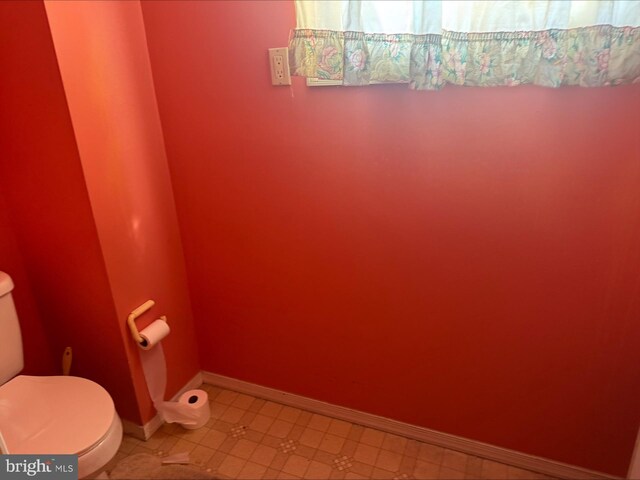 1646 W Norwegian St, Pottsville, PA 17901 - bathroom featuring toilet, baseboards, and tile patterned flooring