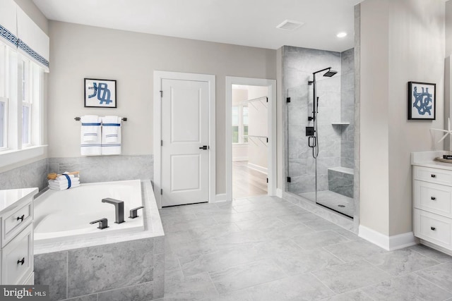 2682 Broadhorn Dr, Odenton, MD 21113 - full bathroom featuring a bath, a shower stall, vanity, baseboards, and recessed lighting