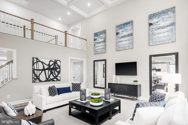 2682 Broadhorn Dr, Odenton, MD 21113 - living area with visible vents, stairs, beamed ceiling, baseboards, and a high ceiling