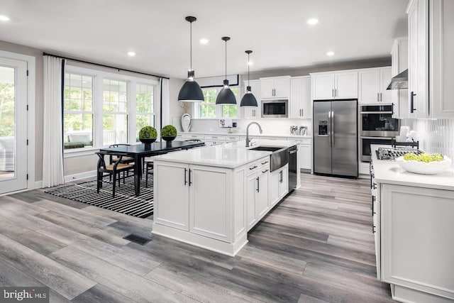 2682 Broadhorn Dr, Odenton, MD 21113 - kitchen featuring a sink, appliances with stainless steel finishes, recessed lighting, and light wood-type flooring