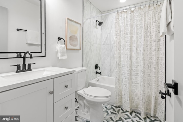 bathroom featuring vanity, shower / bath combination with curtain, and toilet