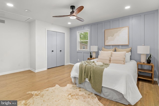 bedroom with recessed lighting, baseboards, light wood finished floors, and visible vents