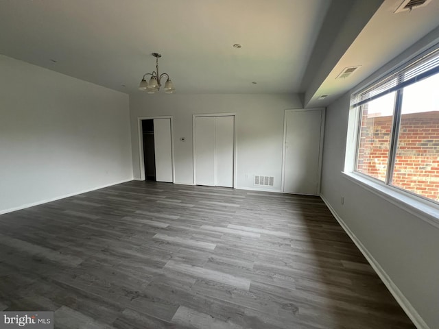 7521 Riverdale Rd Unit 1979, New Carrollton, MD 20784 - interior space with a notable chandelier, visible vents, baseboards, and dark wood-type flooring