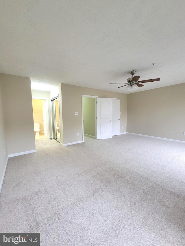 3707 Elmcrest Ln, Bowie, MD 20716 - spare room with baseboards, light carpet, and a ceiling fan