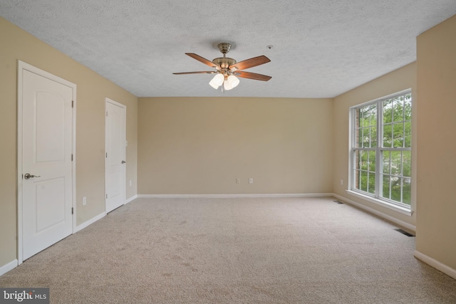 3707 Elmcrest Ln, Bowie, MD 20716 - carpeted empty room with a ceiling fan, baseboards, and a textured ceiling