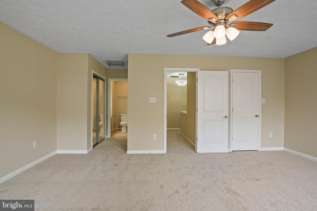 3707 Elmcrest Ln, Bowie, MD 20716 - unfurnished bedroom with carpet, a textured ceiling, baseboards, and ensuite bathroom