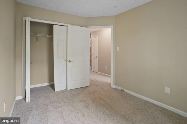 3707 Elmcrest Ln, Bowie, MD 20716 - unfurnished bedroom with carpet flooring, a closet, and baseboards
