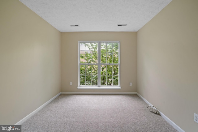 3707 Elmcrest Ln, Bowie, MD 20716 - carpeted empty room with plenty of natural light, baseboards, and a textured ceiling