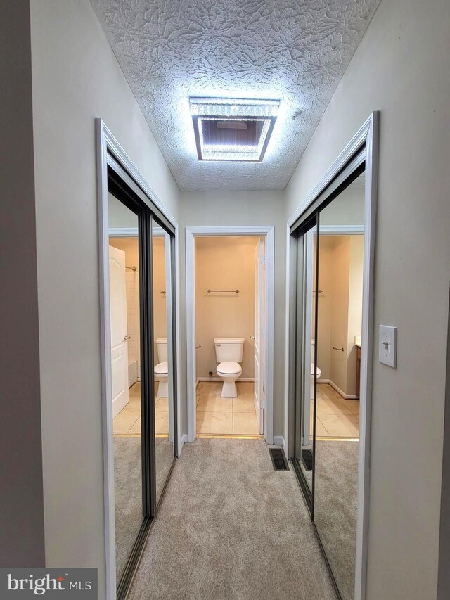 3707 Elmcrest Ln, Bowie, MD 20716 - hallway with carpet flooring and a textured ceiling