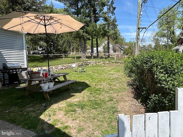 view of yard with fence