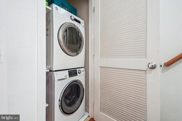 2350 Cobble Hill Ter, Wheaton, MD 20902 - laundry room featuring stacked washer and clothes dryer