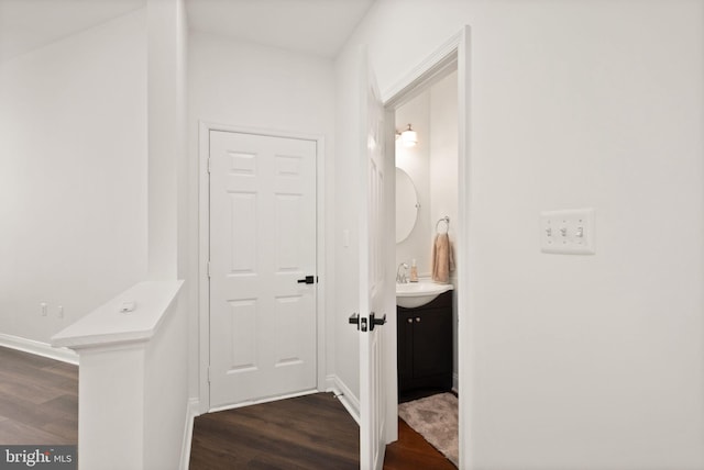902 Santmyer Dr SE, Leesburg, VA 20175 - bathroom with wood finished floors, vanity, and baseboards