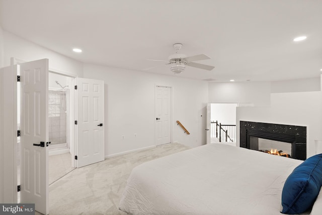 902 Santmyer Dr SE, Leesburg, VA 20175 - bedroom with carpet floors, recessed lighting, ensuite bath, a lit fireplace, and ceiling fan