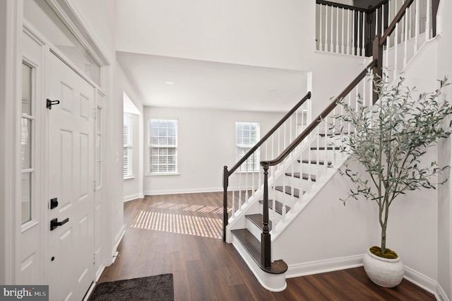902 Santmyer Dr SE, Leesburg, VA 20175 - foyer featuring wood finished floors, stairway, and baseboards