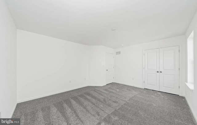 635 Gordon House Way, Middletown, DE 19709 - unfurnished bedroom with carpet flooring, baseboards, and a closet