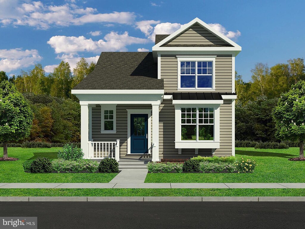 420 Dexter Dr Unit 141Alrich, Carriage, Middletown, DE 19709 - view of front of house with a front yard and a porch