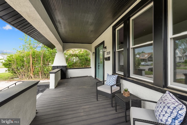 wooden deck with covered porch