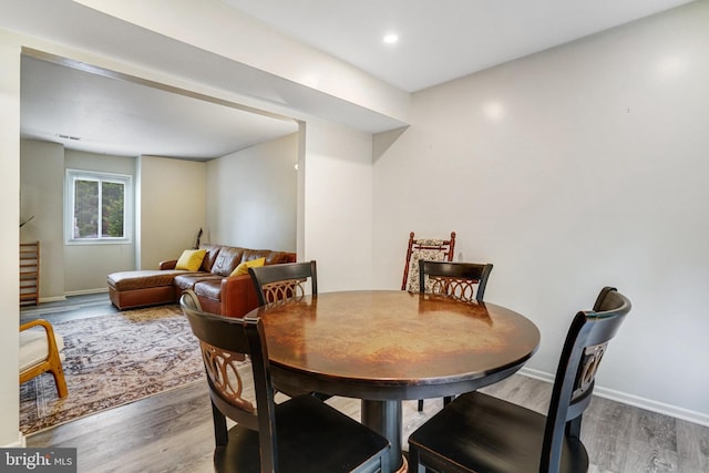 5111 Arrit Ct, Burke, VA 22015 - dining space with wood finished floors, baseboards, and recessed lighting