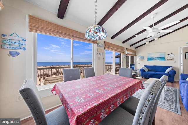 4505-4507 Ocean Blvd, Long Beach Township, NJ 08008 - dining room featuring a water view, lofted ceiling with beams, ceiling fan, and wood finished floors