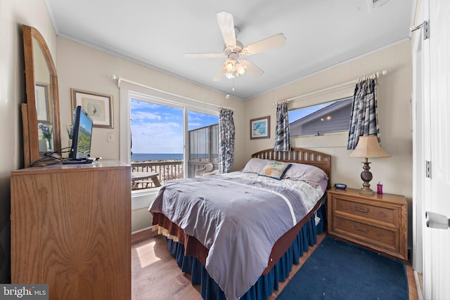 4505-4507 Ocean Blvd, Long Beach Township, NJ 08008 - bedroom featuring ornamental molding, wood finished floors, a ceiling fan, and access to exterior