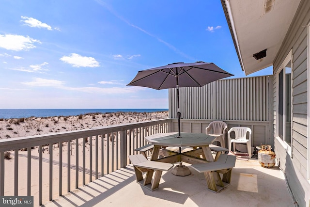 4505-4507 Ocean Blvd, Long Beach Township, NJ 08008 - balcony featuring a water view, outdoor dining area, and a view of the beach