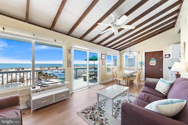 4505-4507 Ocean Blvd, Long Beach Township, NJ 08008 - living room with wood finished floors, ceiling fan, and vaulted ceiling with beams