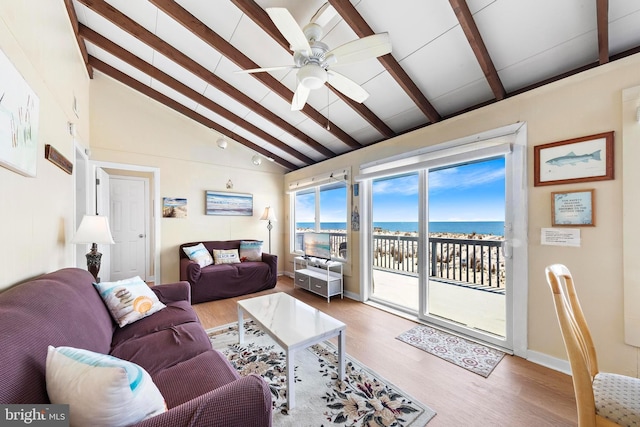 4505-4507 Ocean Blvd, Long Beach Township, NJ 08008 - living room featuring a ceiling fan, baseboards, wood finished floors, and lofted ceiling with beams
