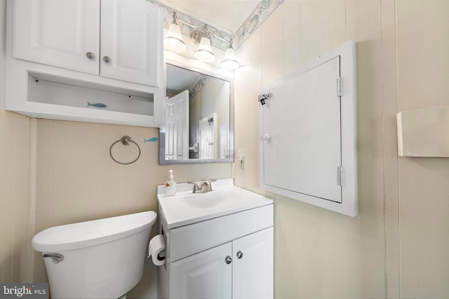 4505-4507 Ocean Blvd, Long Beach Township, NJ 08008 - bathroom featuring vanity, toilet, and a decorative wall