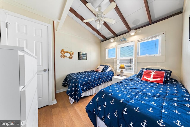 4505-4507 Ocean Blvd, Long Beach Township, NJ 08008 - bedroom with wood finished floors, lofted ceiling with beams, and ceiling fan