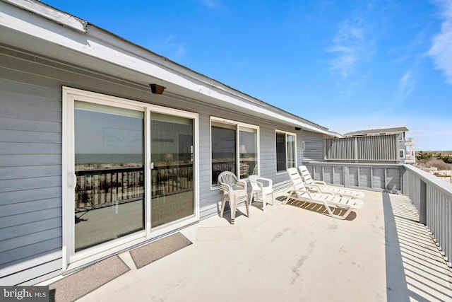 4505-4507 Ocean Blvd, Long Beach Township, NJ 08008 - view of patio / terrace with a balcony