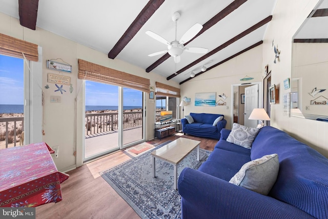 4505-4507 Ocean Blvd, Long Beach Township, NJ 08008 - living area with a ceiling fan, a water view, vaulted ceiling with beams, and wood finished floors