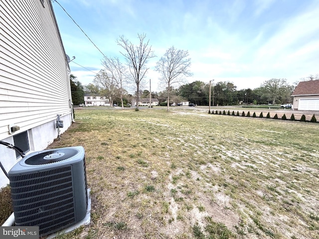 view of yard featuring central AC