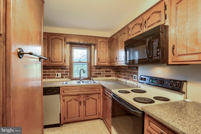 501 Walker Hill Rd, Newport, PA 17074 - kitchen featuring black microwave, electric range oven, dishwasher, a sink, and tasteful backsplash