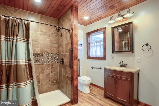 501 Walker Hill Rd, Newport, PA 17074 - full bathroom with wooden ceiling, tiled shower, wood finished floors, recessed lighting, and toilet