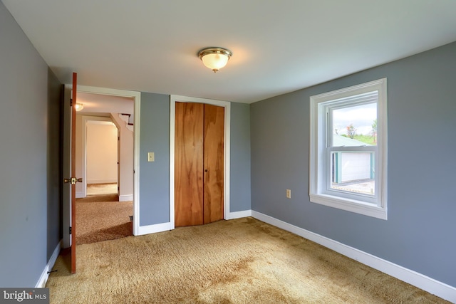 501 Walker Hill Rd, Newport, PA 17074 - unfurnished bedroom featuring light carpet, a closet, and baseboards