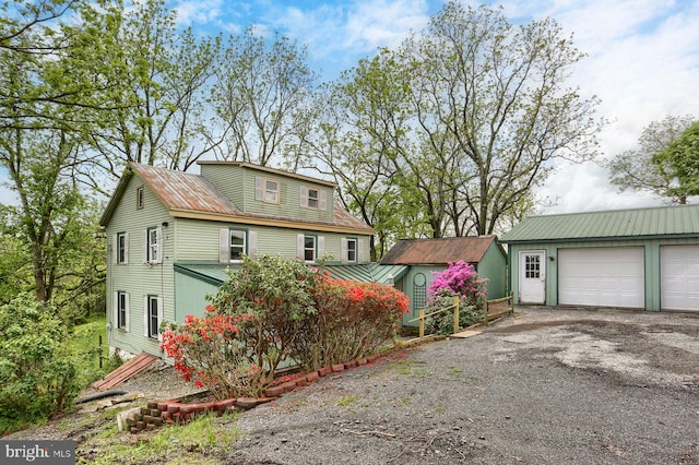 501 Walker Hill Rd, Newport, PA 17074 - view of front of property with metal roof, an outdoor structure, and a garage