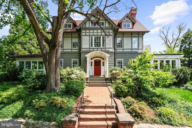 3101 Highland Pl NW, Washington, DC 20008 - tudor-style house with stucco siding and a chimney