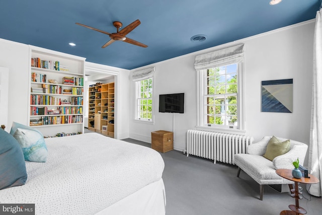 3101 Highland Pl NW, Washington, DC 20008 - bedroom featuring visible vents, radiator, crown molding, and a spacious closet
