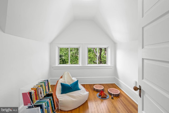 3101 Highland Pl NW, Washington, DC 20008 - sitting room with wood-type flooring, baseboards, and lofted ceiling