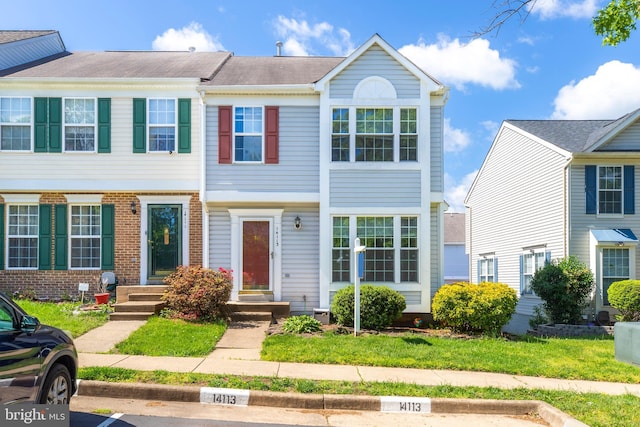 multi unit property featuring brick siding