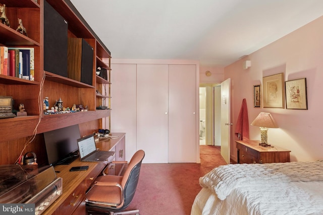 carpeted bedroom with a closet