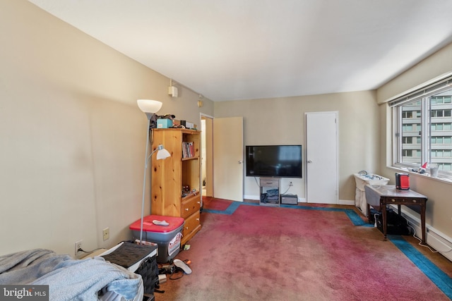 carpeted living room featuring baseboards