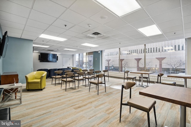 lobby featuring a paneled ceiling