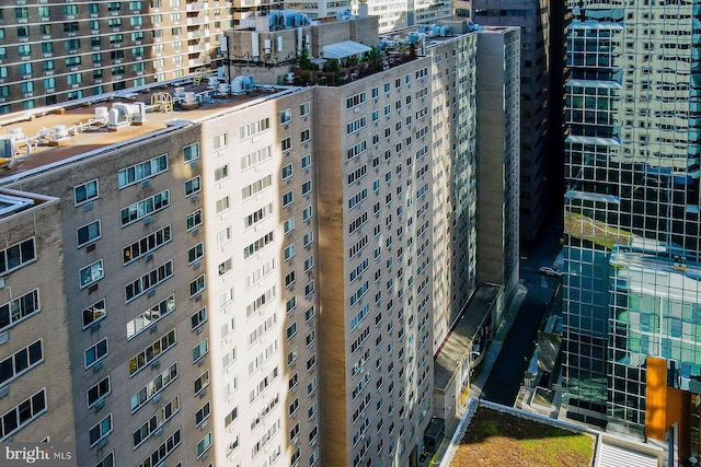 view of building exterior featuring a view of city