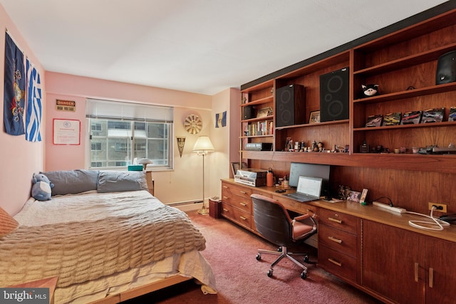 bedroom with a baseboard radiator and carpet floors