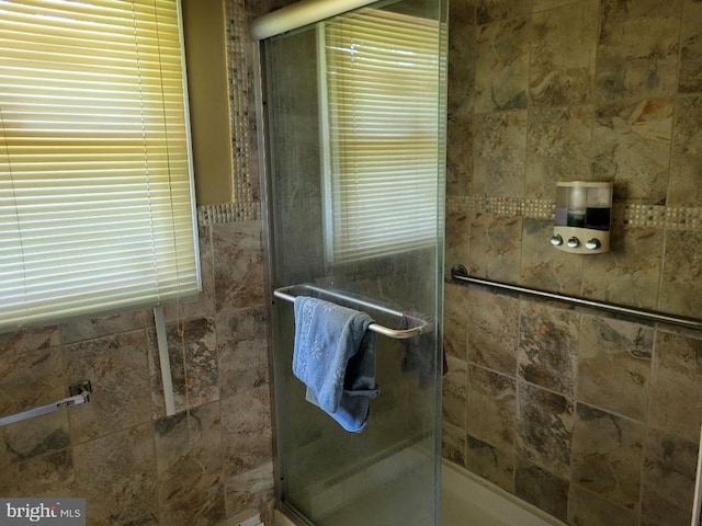 bathroom featuring a stall shower