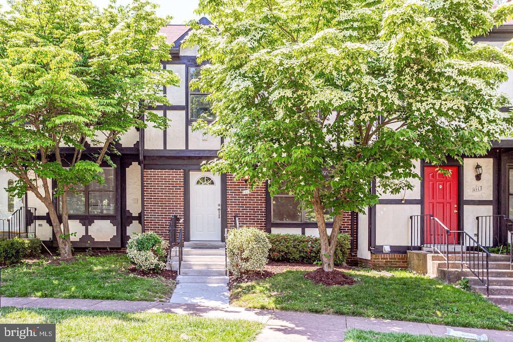 view of front of property with brick siding
