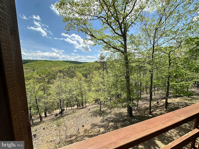 exterior space with a view of trees