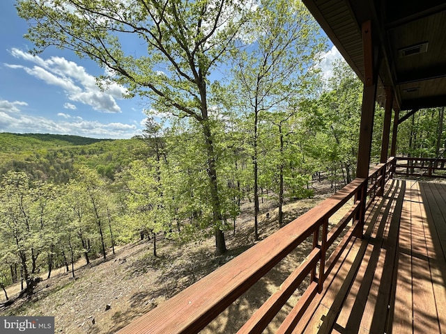 deck with a forest view